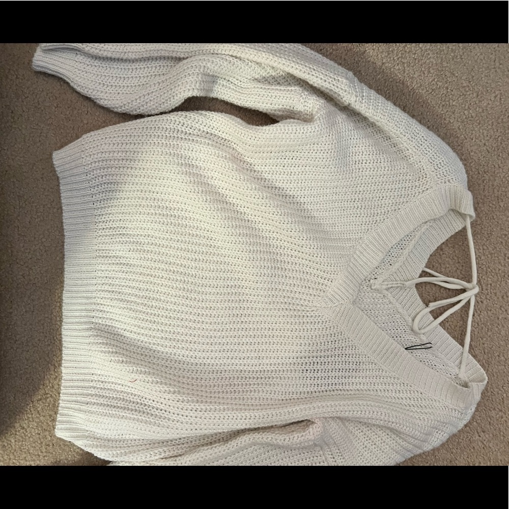 UNWORN WHITE ZAFUL SWEATER WITH TIE IN BACK SIZE MEDIUM